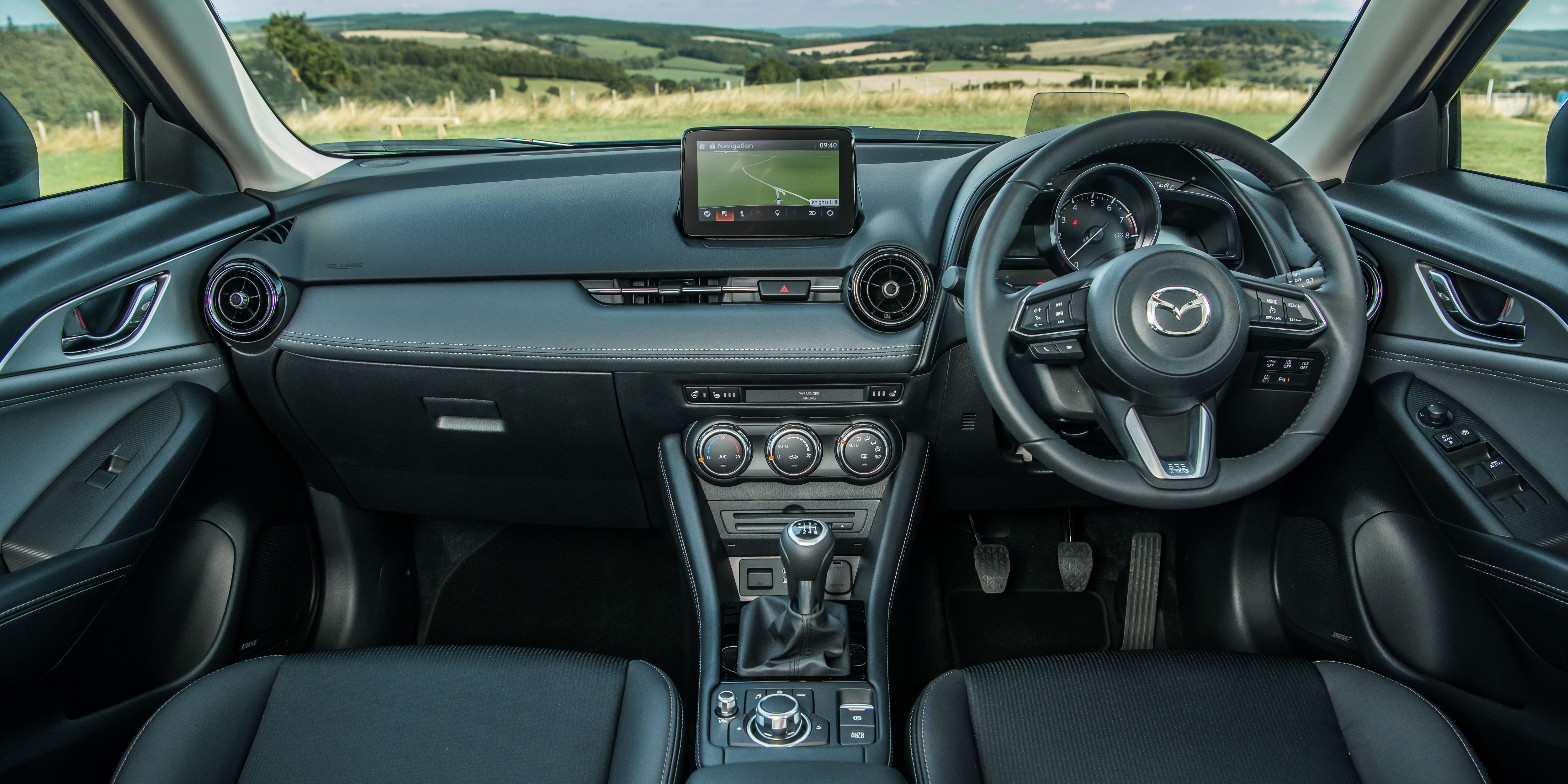 The CX-3's cabin is easy to use, but the plastics feel a bit cheap in places