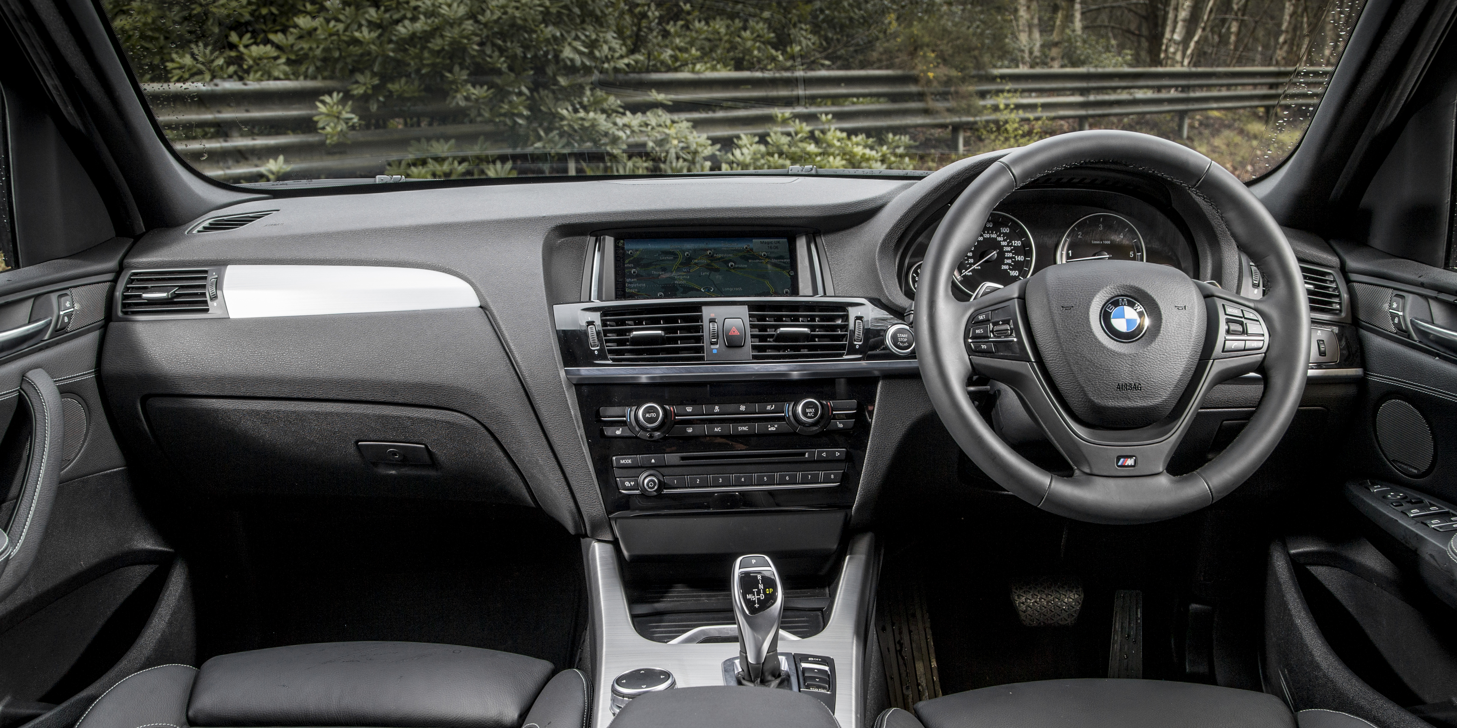 The interior looks sporty, but isn't as luxurious as that in a Mercedes GLC