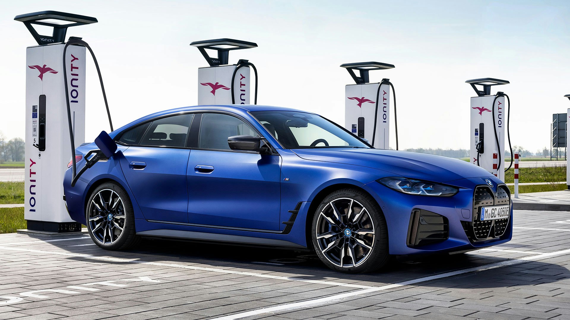 New 544hp BMW i4 M50 EV revealed, UK prices and specs confirmed  carwow