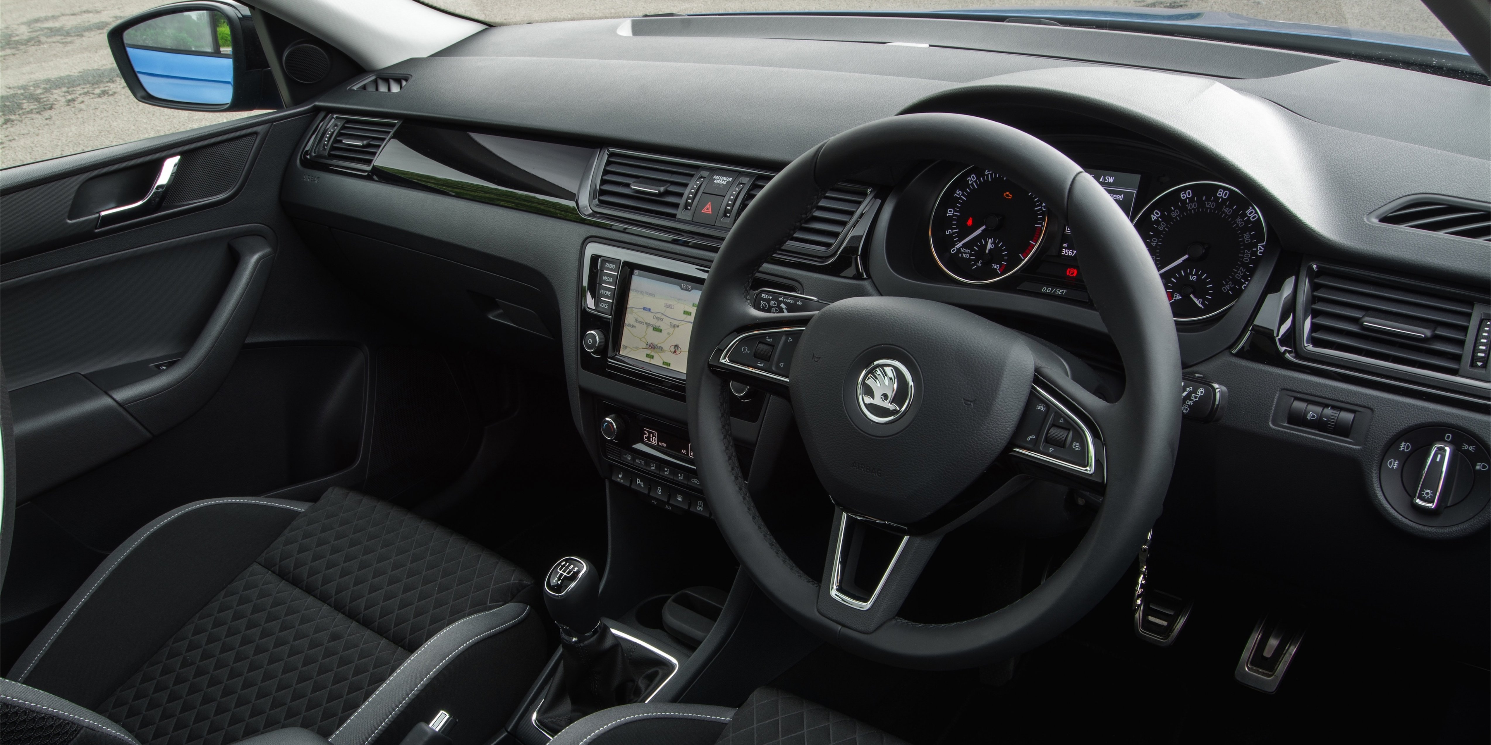 The Skoda's interior is dull but well built